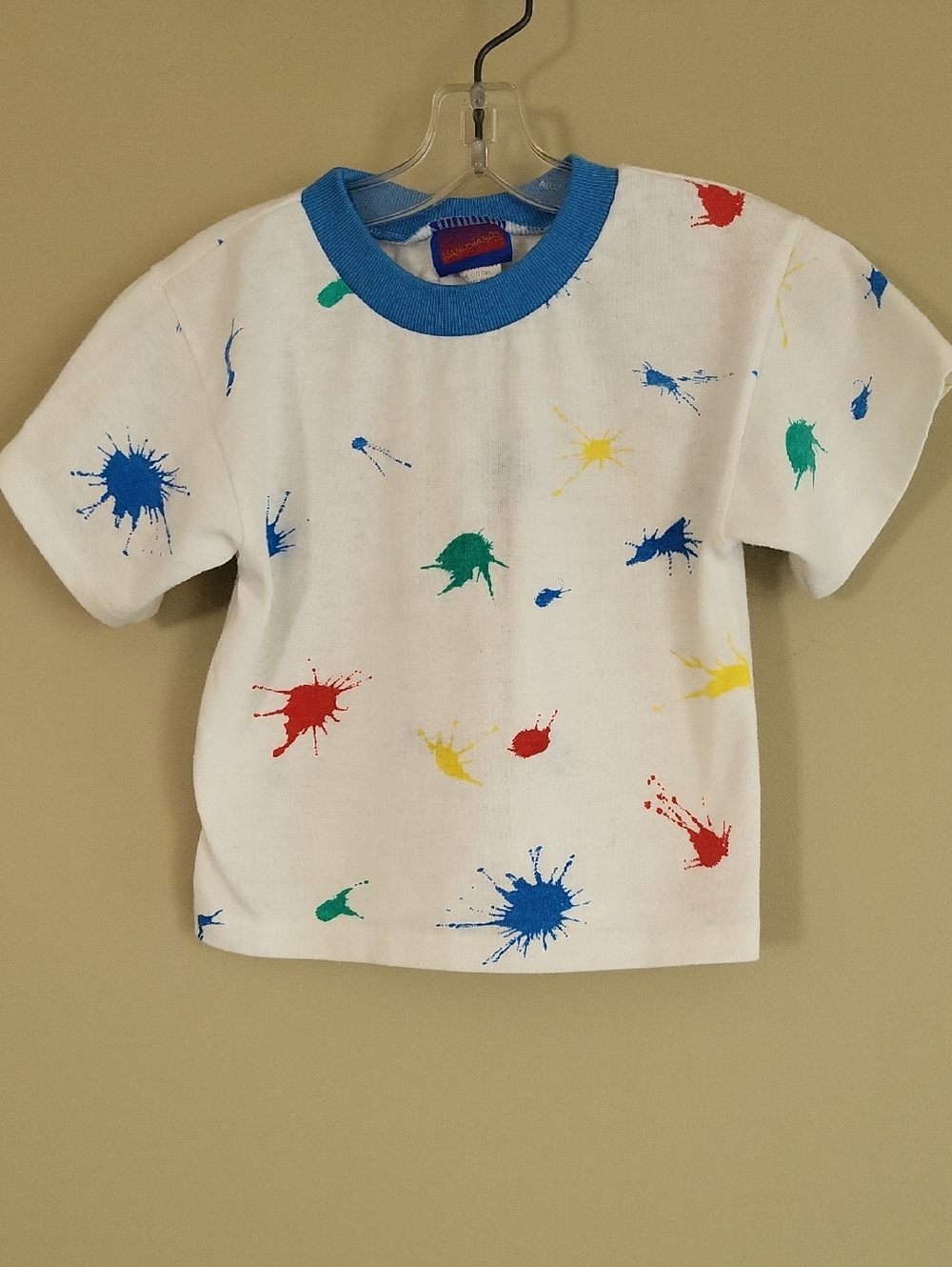 Vintage white tee shirt with multicolor paint splatters